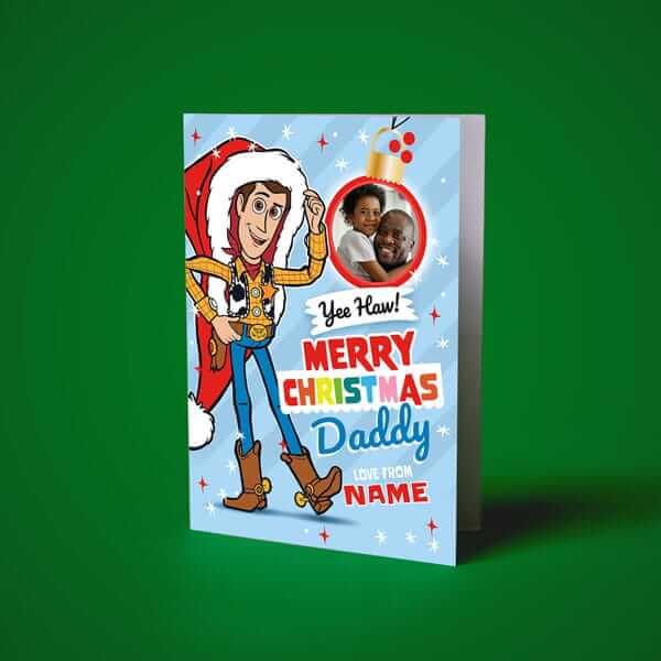 Personalised Disney Toy Story Christmas card featuring Woody in a Santa hat and a photo upload frame, displayed against a green background.